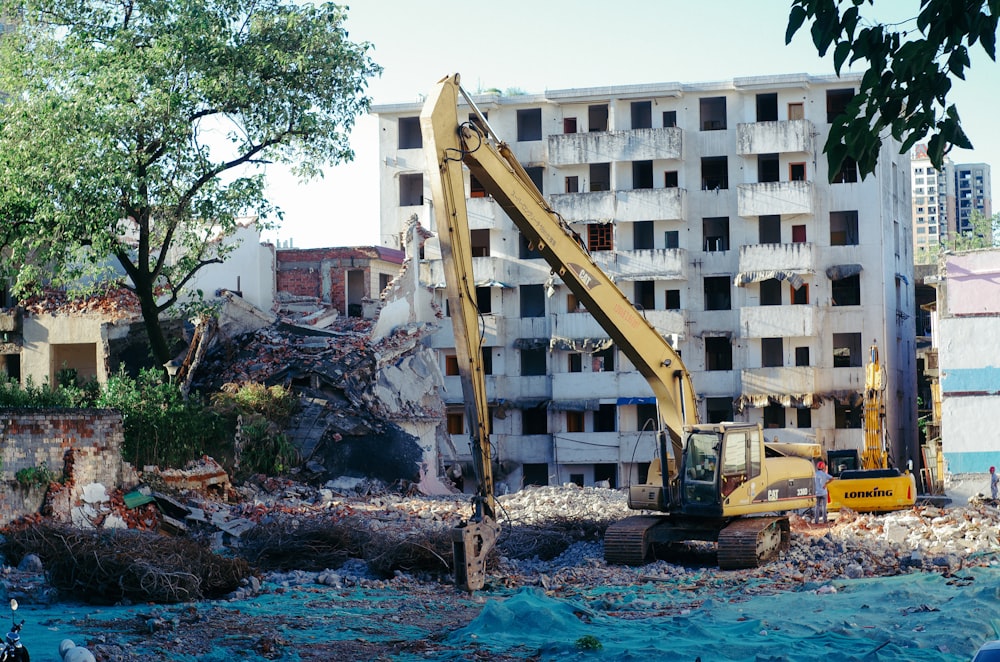 a construction site with a crane in the foreground