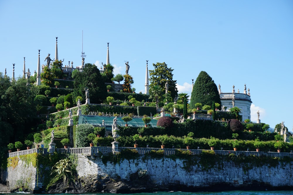 a large hill with lots of trees on top of it