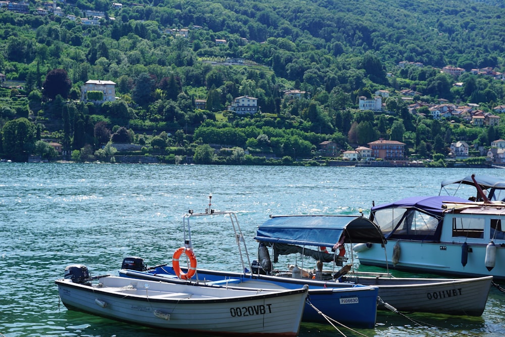 a couple of boats that are sitting in the water