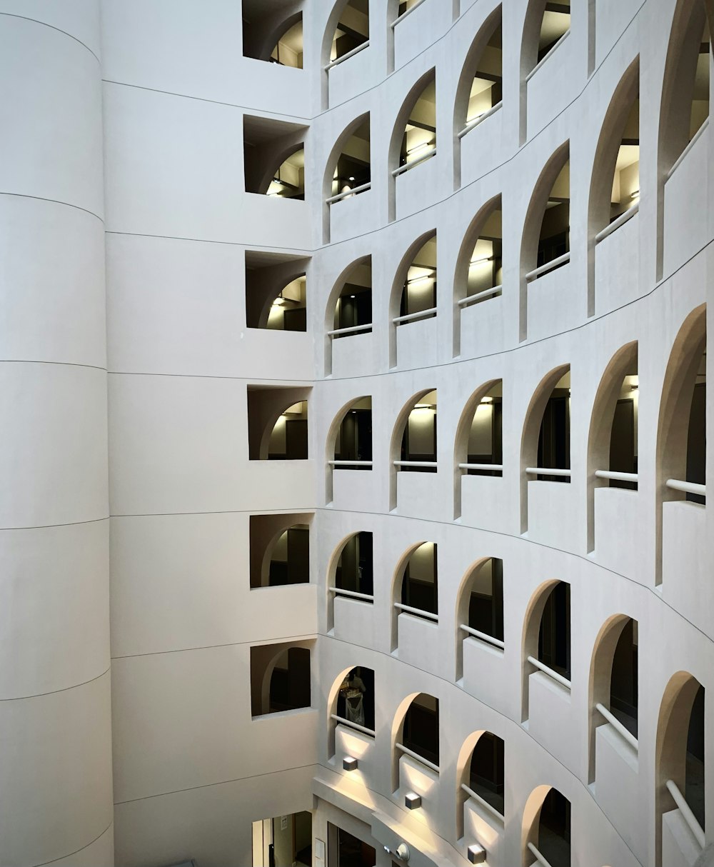 a large white building with lots of windows