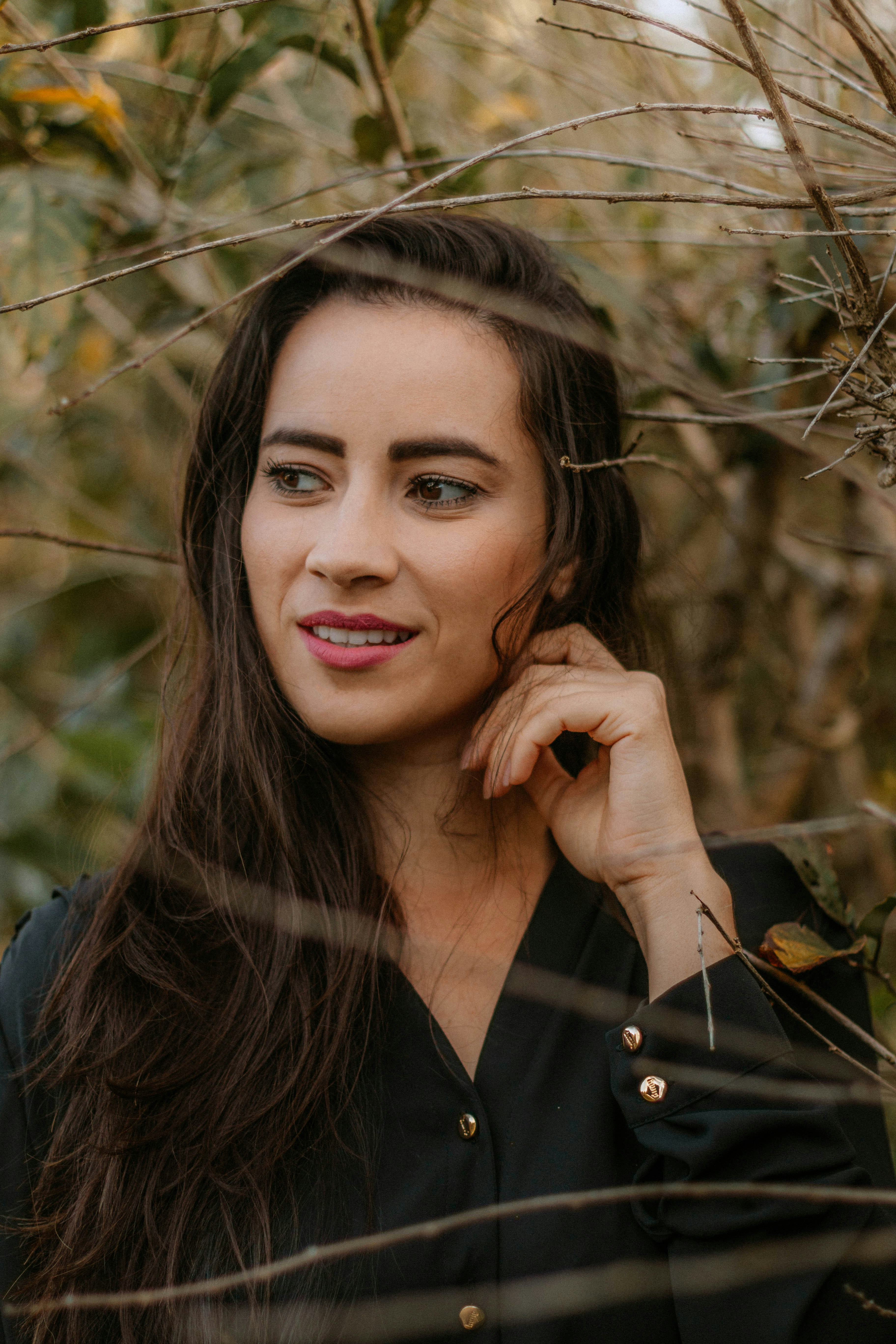 woman wearing yellow long-sleeved dress under white clouds and blue sky during daytime