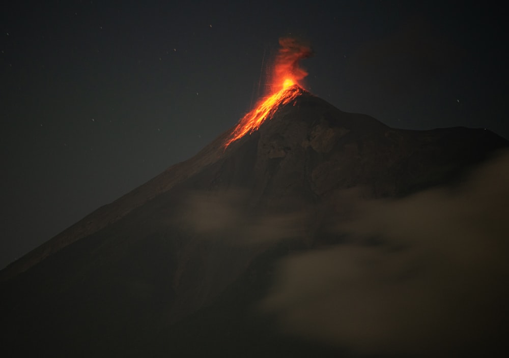 a very tall mountain with a very bright orange substance on top of it