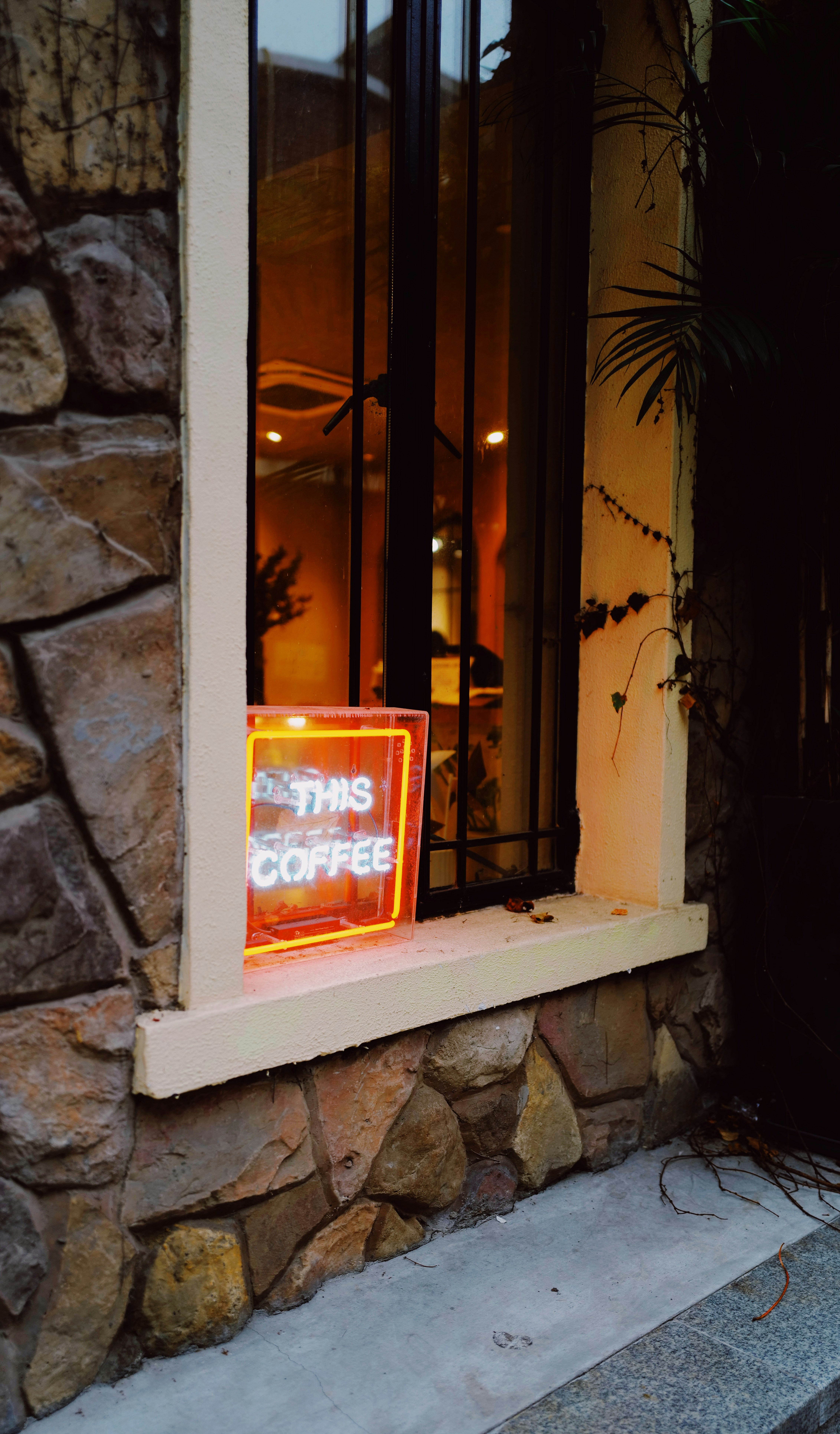 A sign that is sitting on a window sill photo – Free Photography Image ...