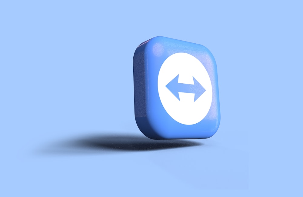 a blue button with an arrow pointing to the right