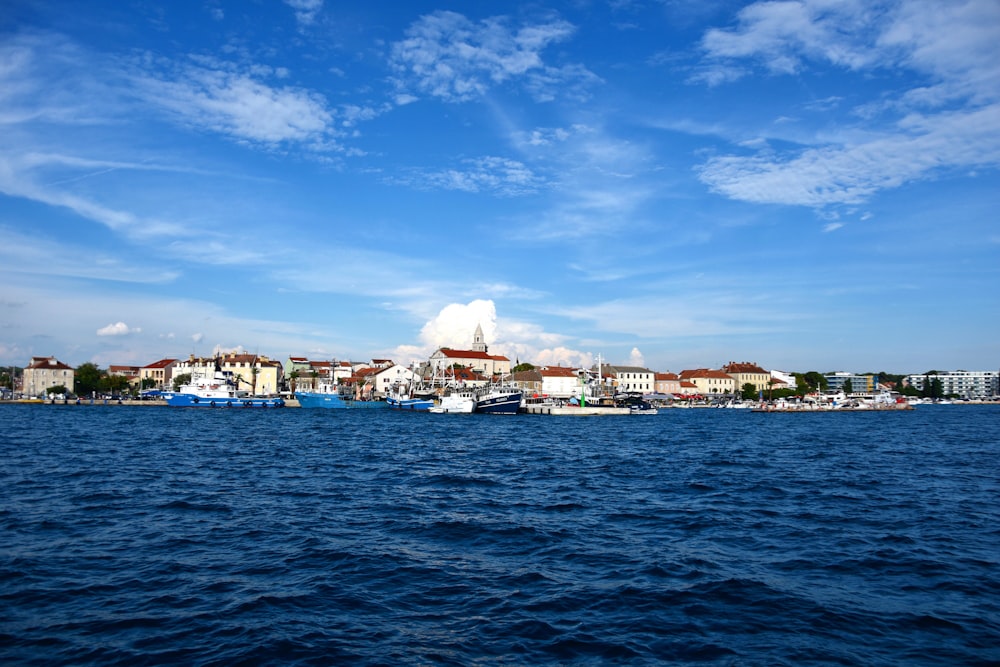 a body of water with a bunch of boats in it