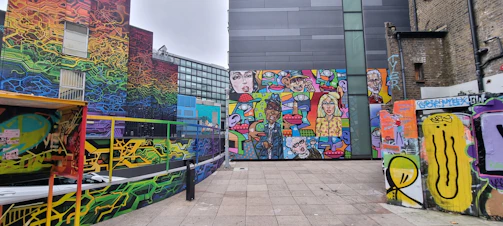 A vibrant mural painted by a local graffiti artist in an urban alley.