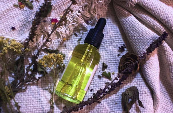 a bottle of perfume sitting on top of a table