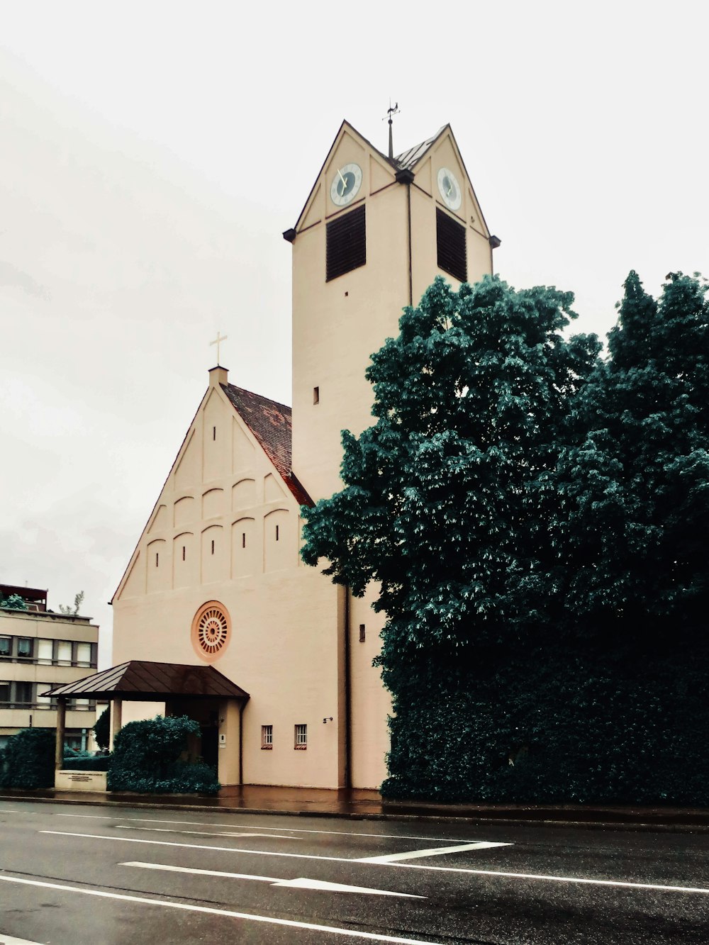 a church with a clock on the front of it