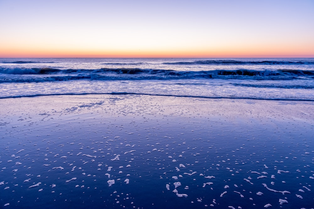 a beach that has some water on it