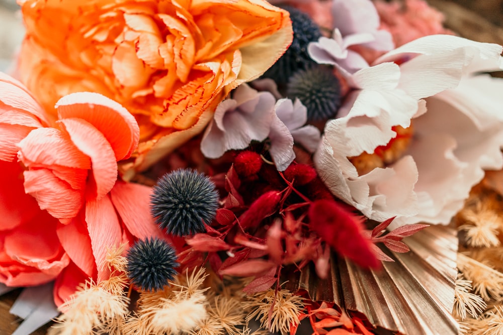 a bunch of flowers that are on a table