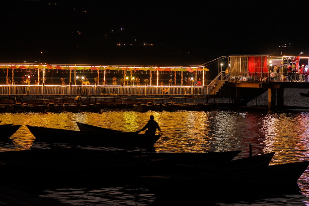 a couple of boats that are sitting in the water