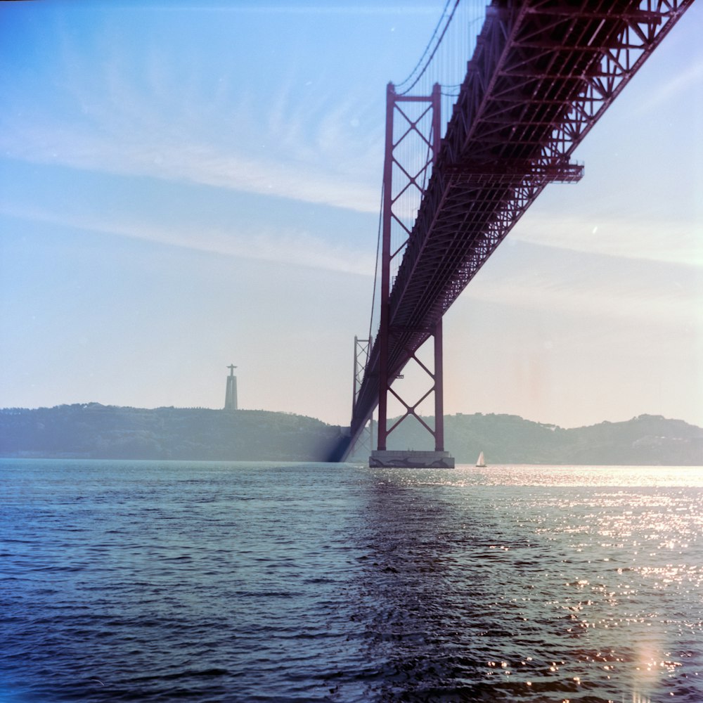 a large bridge spanning over a large body of water