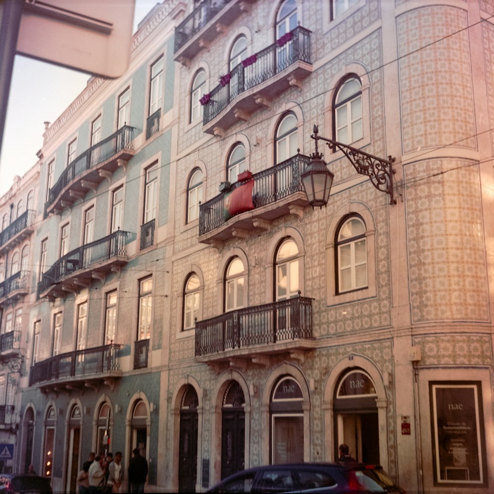 a tall building with balconies and balconies on the balconies