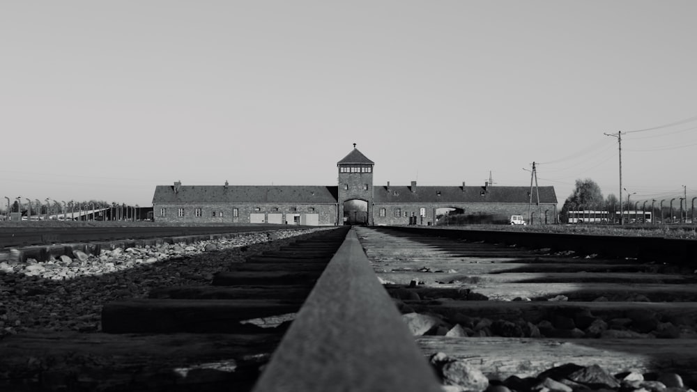 a black and white photo of a train track