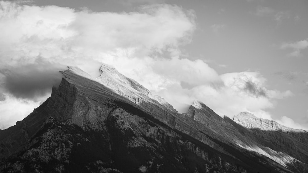 a black and white photo of a mountain