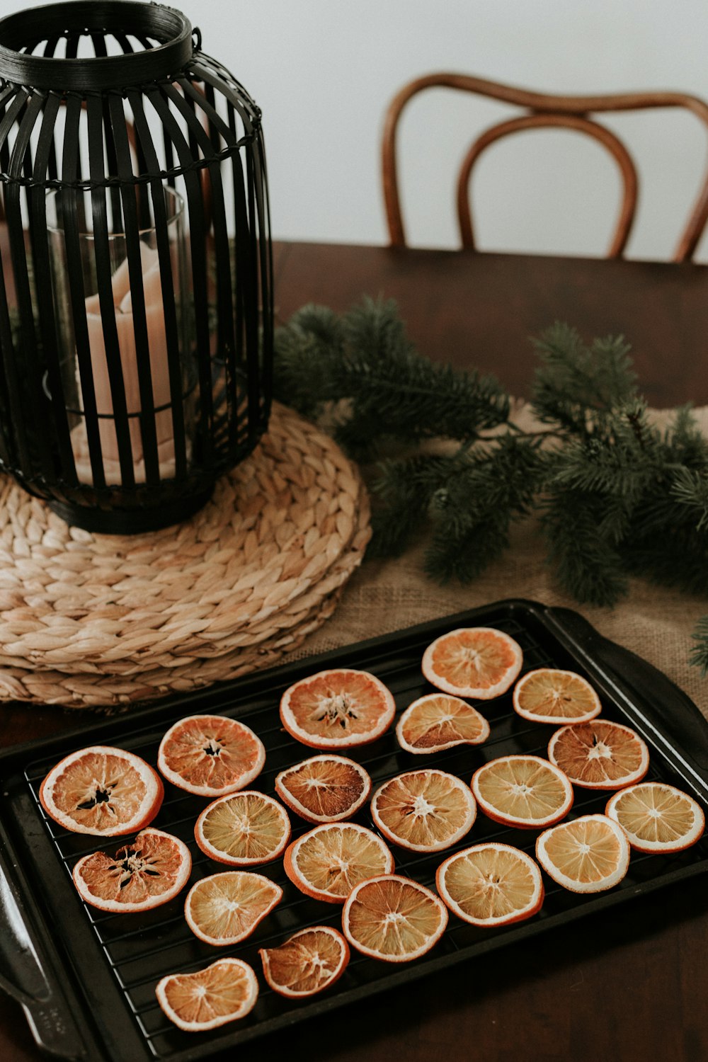 a tray of sliced oranges sitting on a table