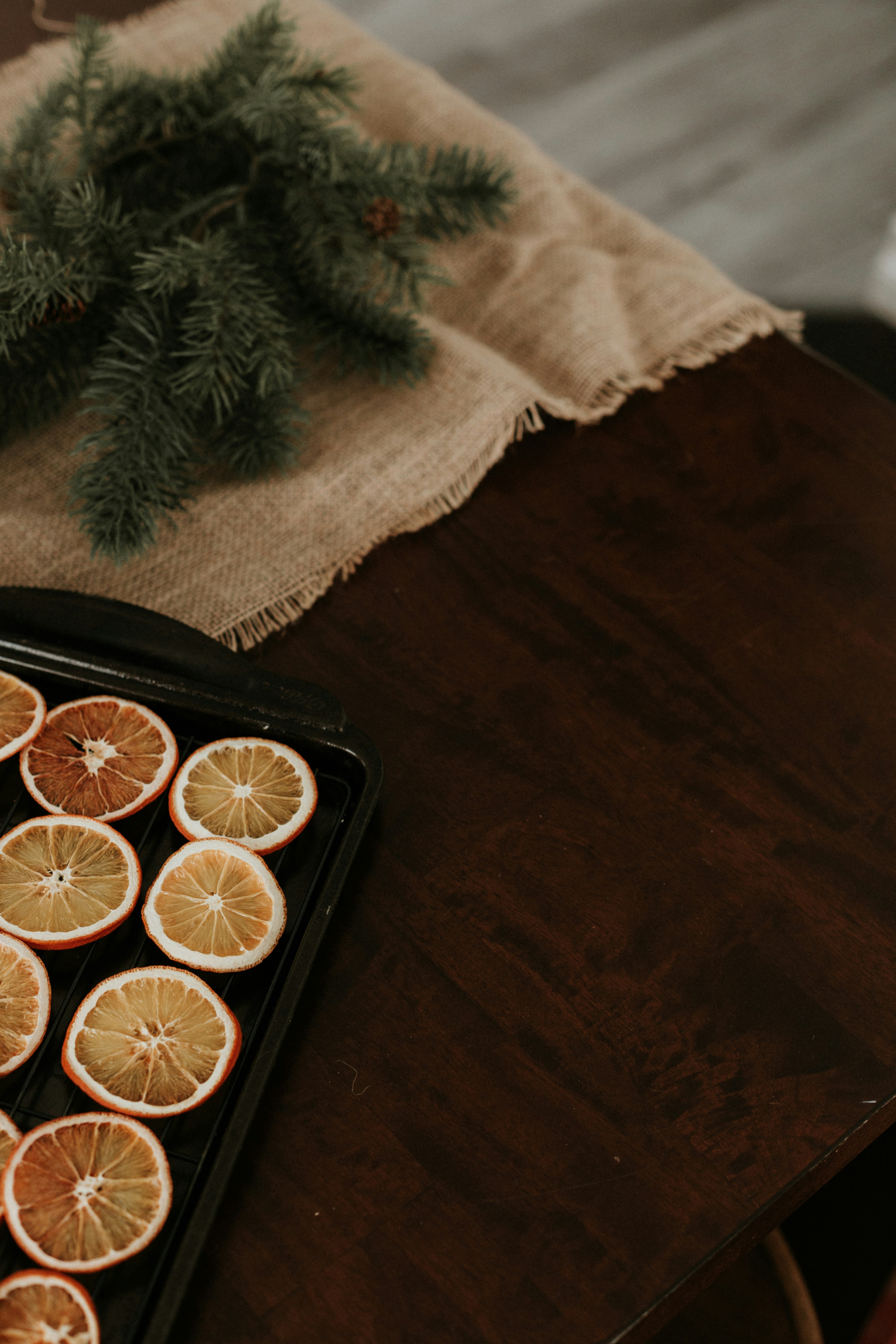 a tray of sliced oranges sitting on a table