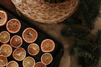 a tray of sliced oranges sitting on a table