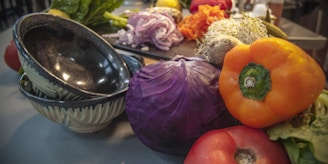 A warm kitchen scene with fresh vegetables and cooking tools ready for meal prep