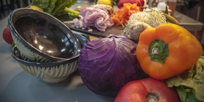 A warm kitchen scene with fresh vegetables and cooking tools ready for meal prep
