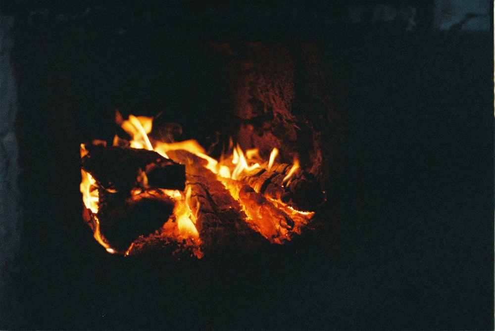 a close up of a fire burning in a fireplace