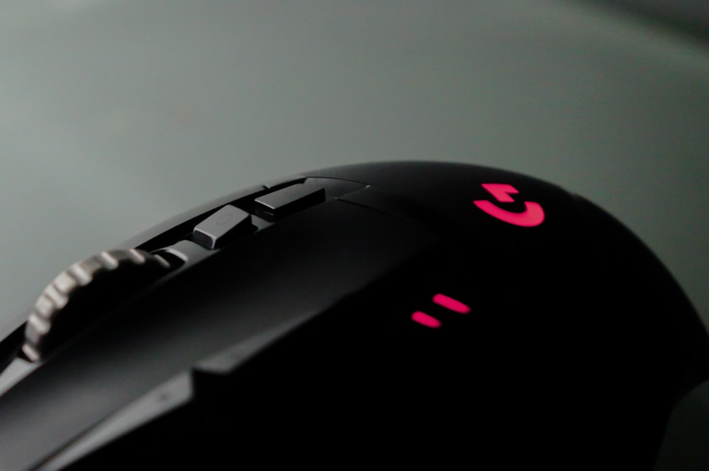 a close up of a computer mouse on a table