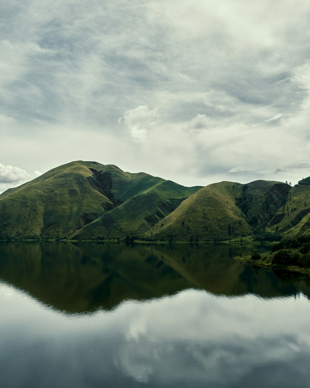 a large body of water surrounded by mountains