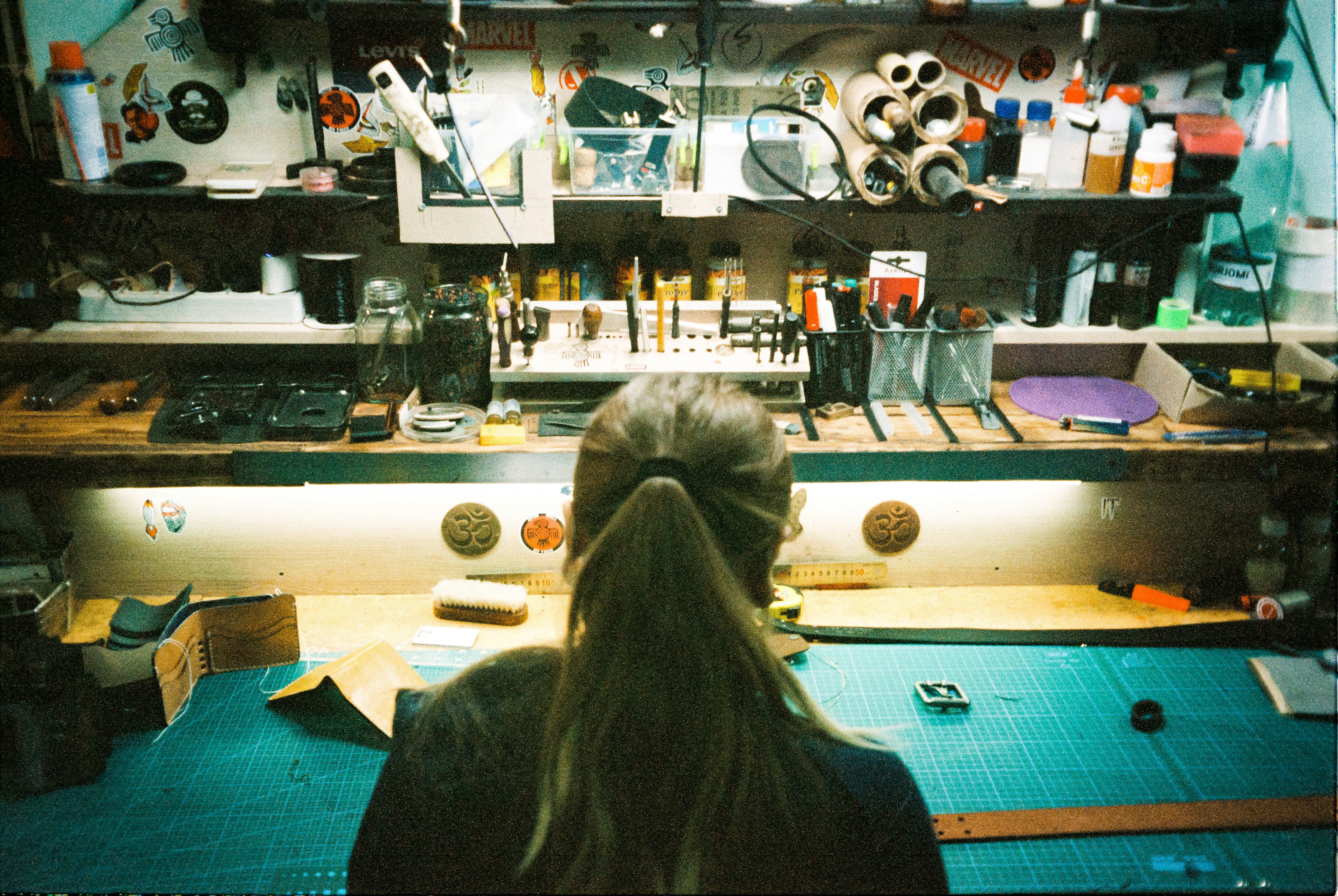 a woman standing in front of a counter top