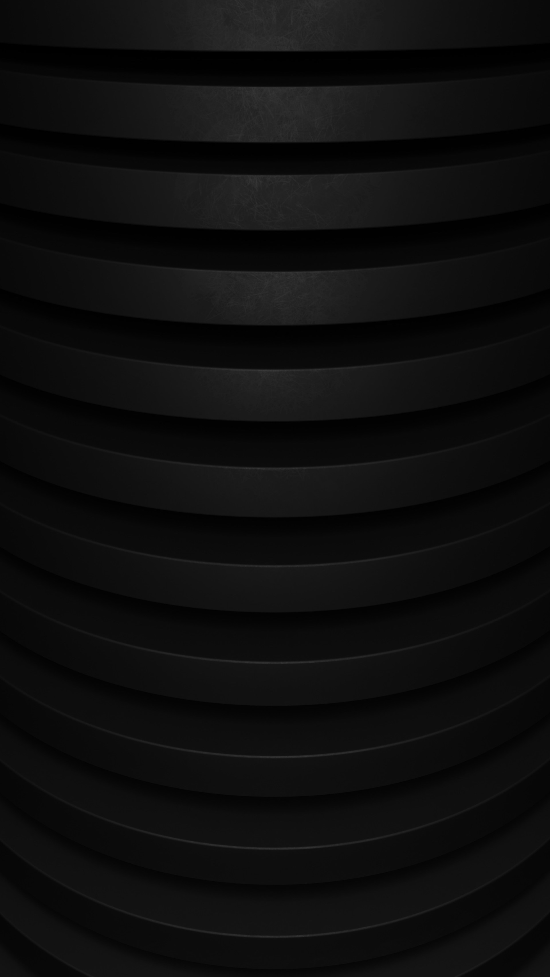 a close up of a black circular object