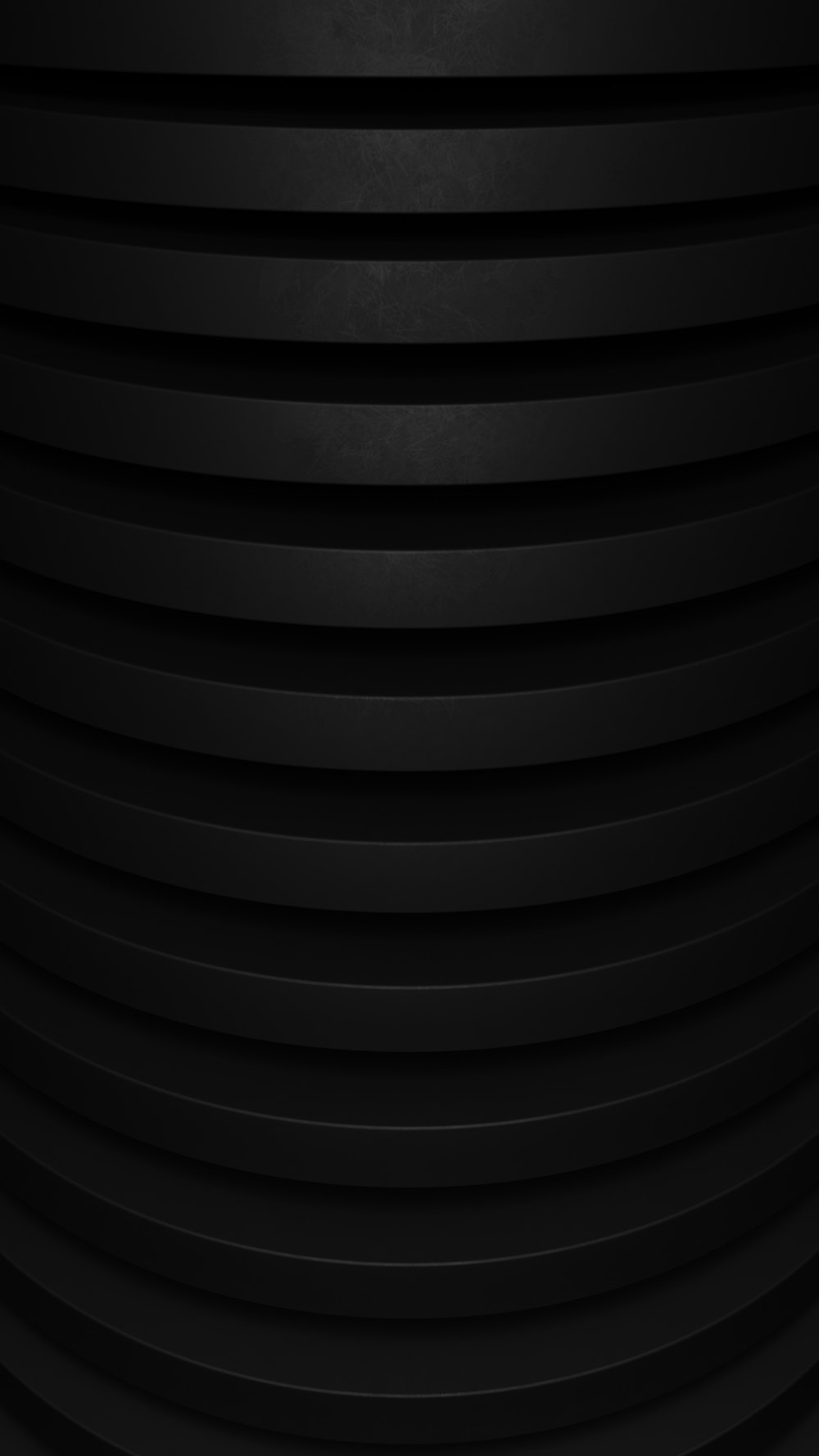 a close up of a black circular object
