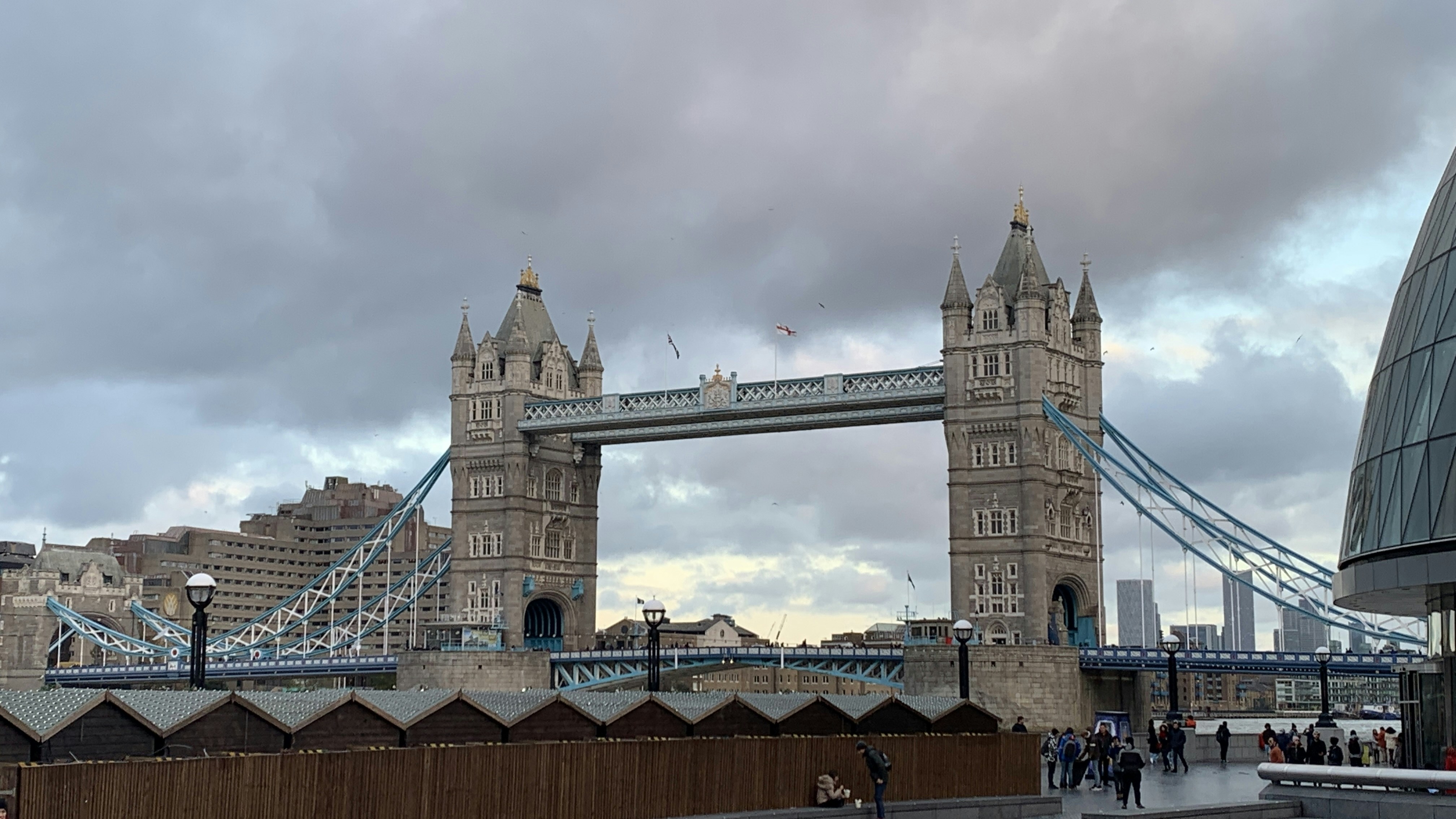 a bridge that has a tower with a clock on it