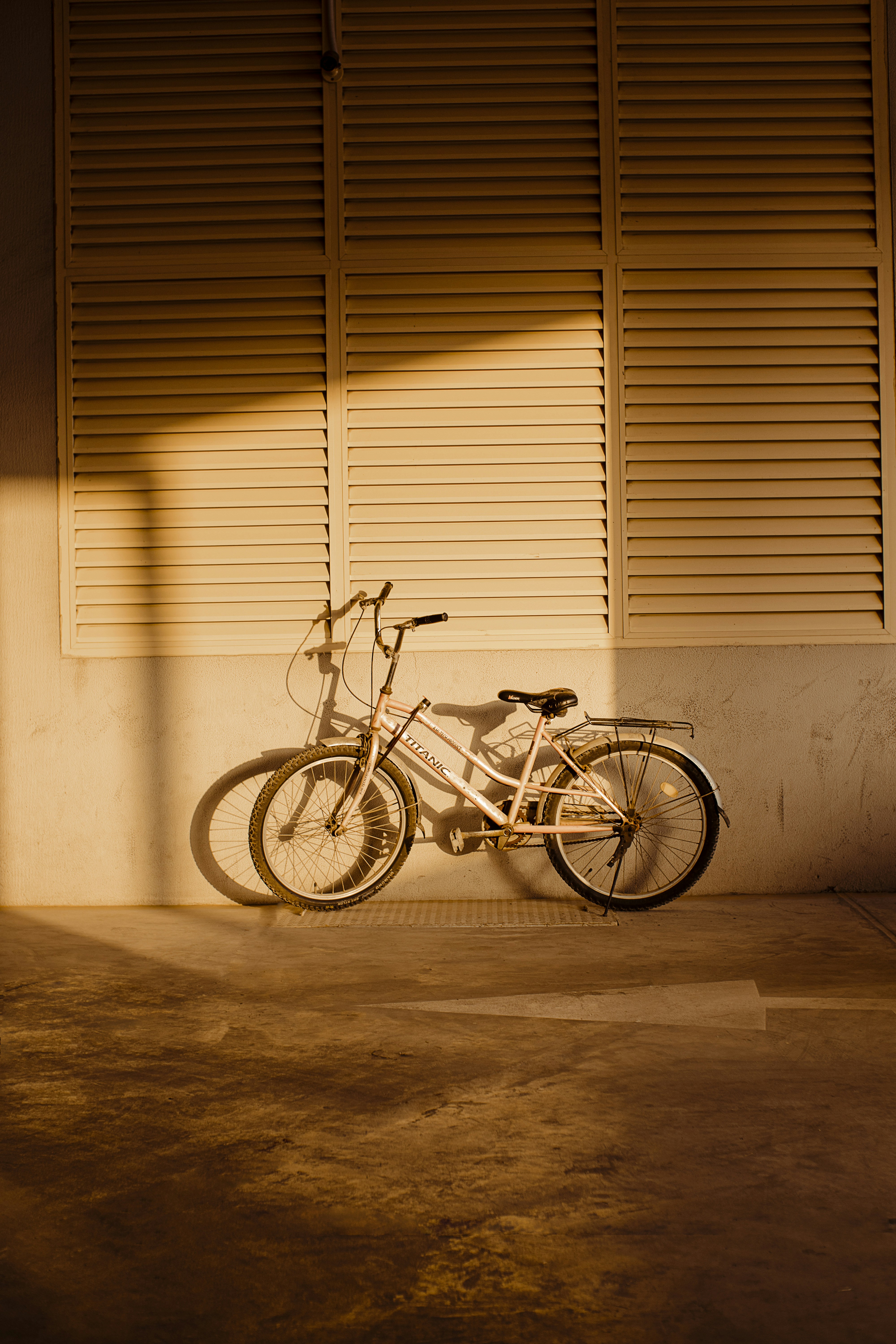a bike is parked in front of a building