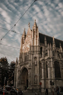 a large cathedral with a sky background