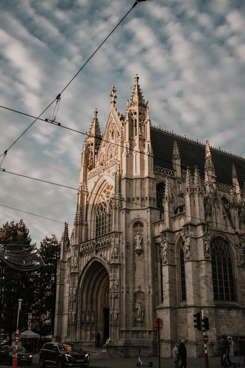 a large cathedral with a sky background