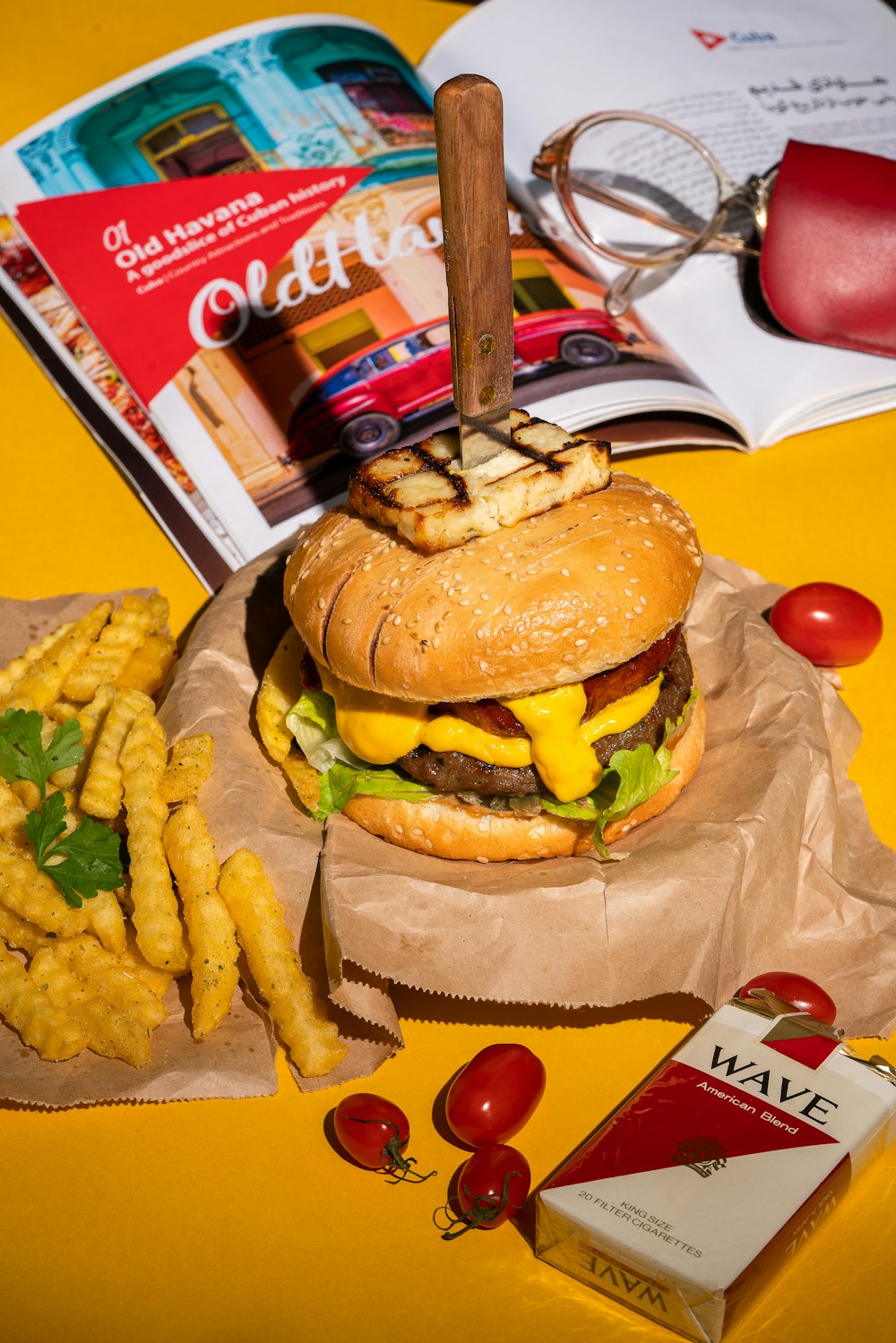 a hamburger and french fries on a table