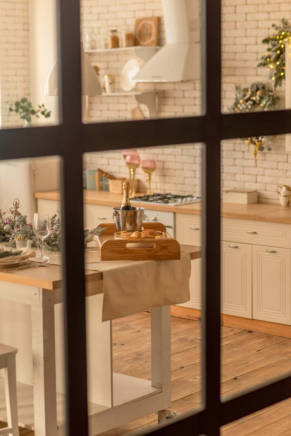 a view of a kitchen through a window