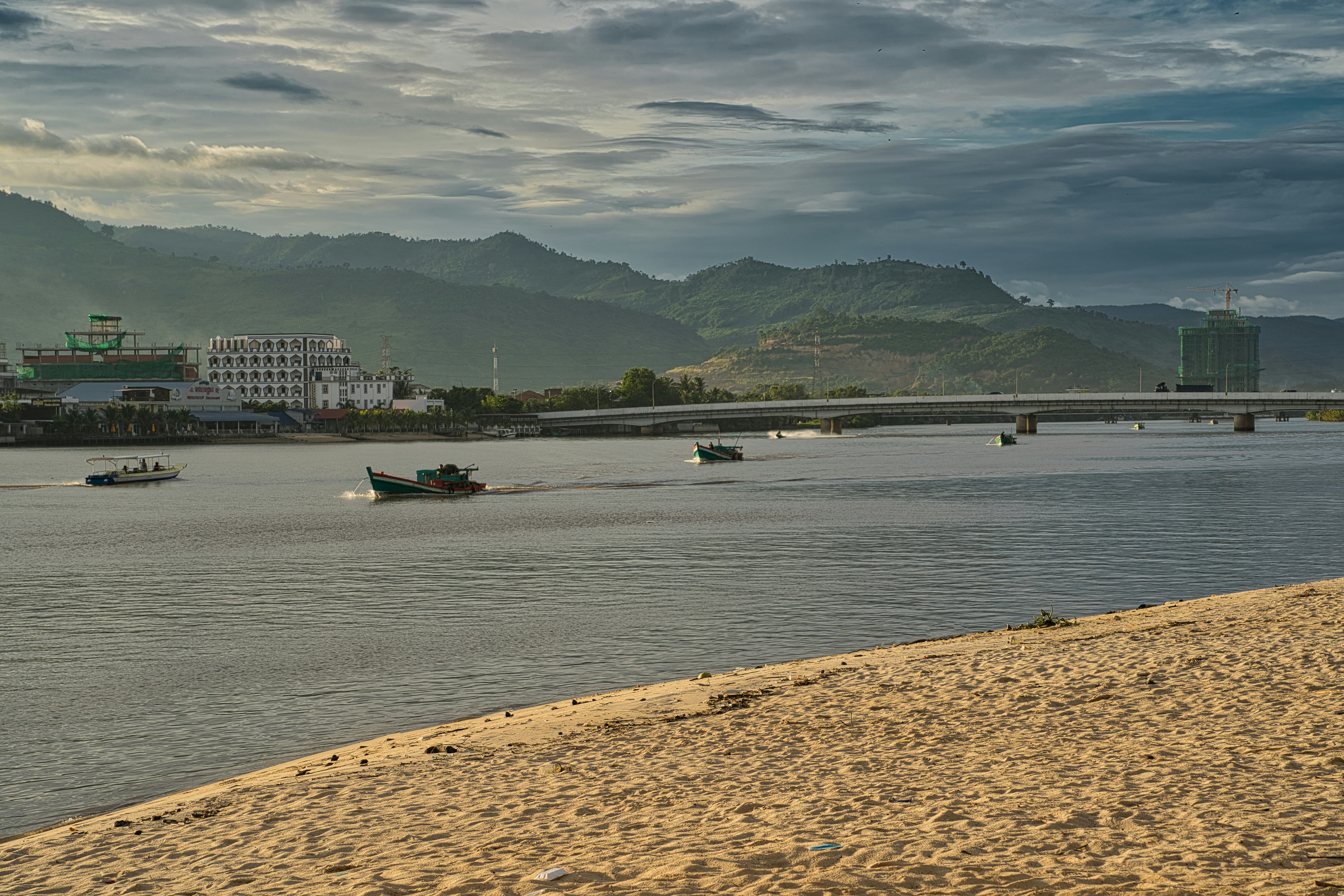 a body of water with boats floating on top of it