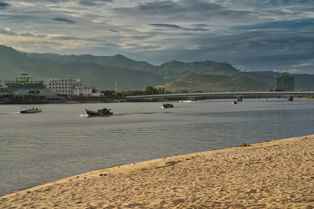 a body of water with boats floating on top of it