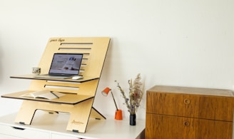 a desk with a computer on top of it