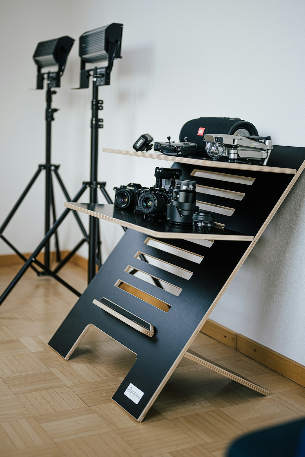 a camera and a tripod stand in a room
