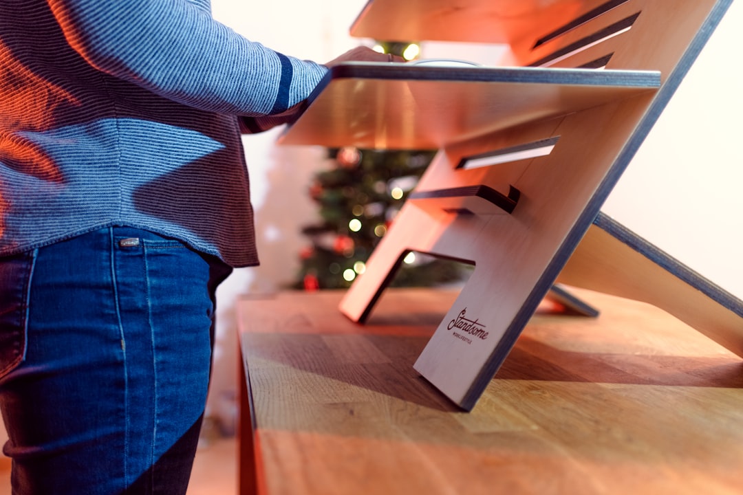person working on a stand-up desk