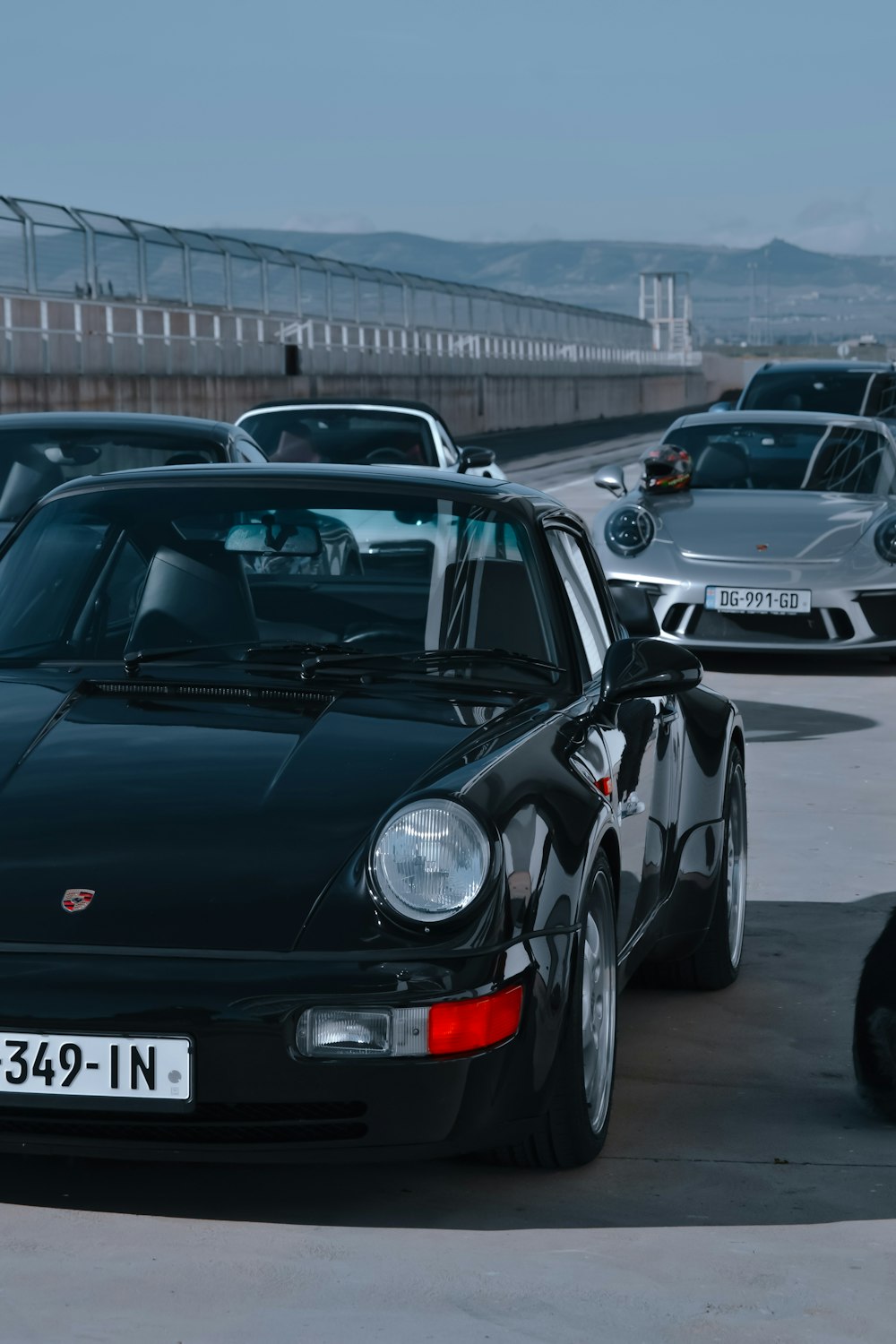 a group of cars parked in a parking lot