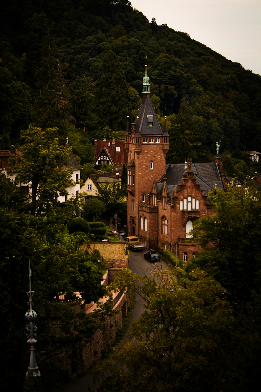 a large brick building with a steeple on top of it