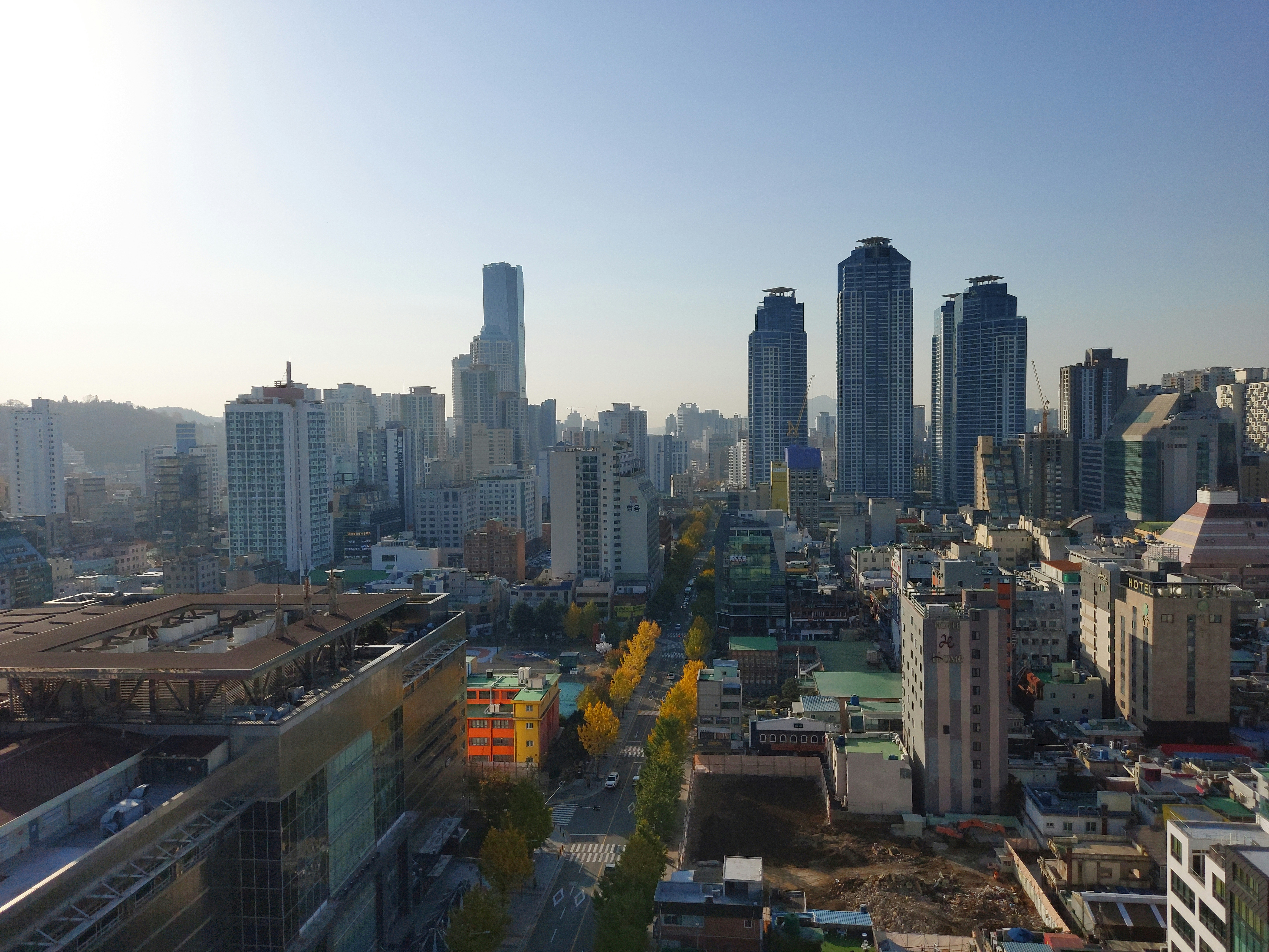 a view of a city with tall buildings