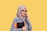 a woman in a hijab talking on a cell phone