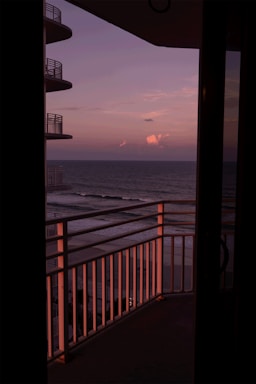 Luxury condo balcony overlooking the ocean