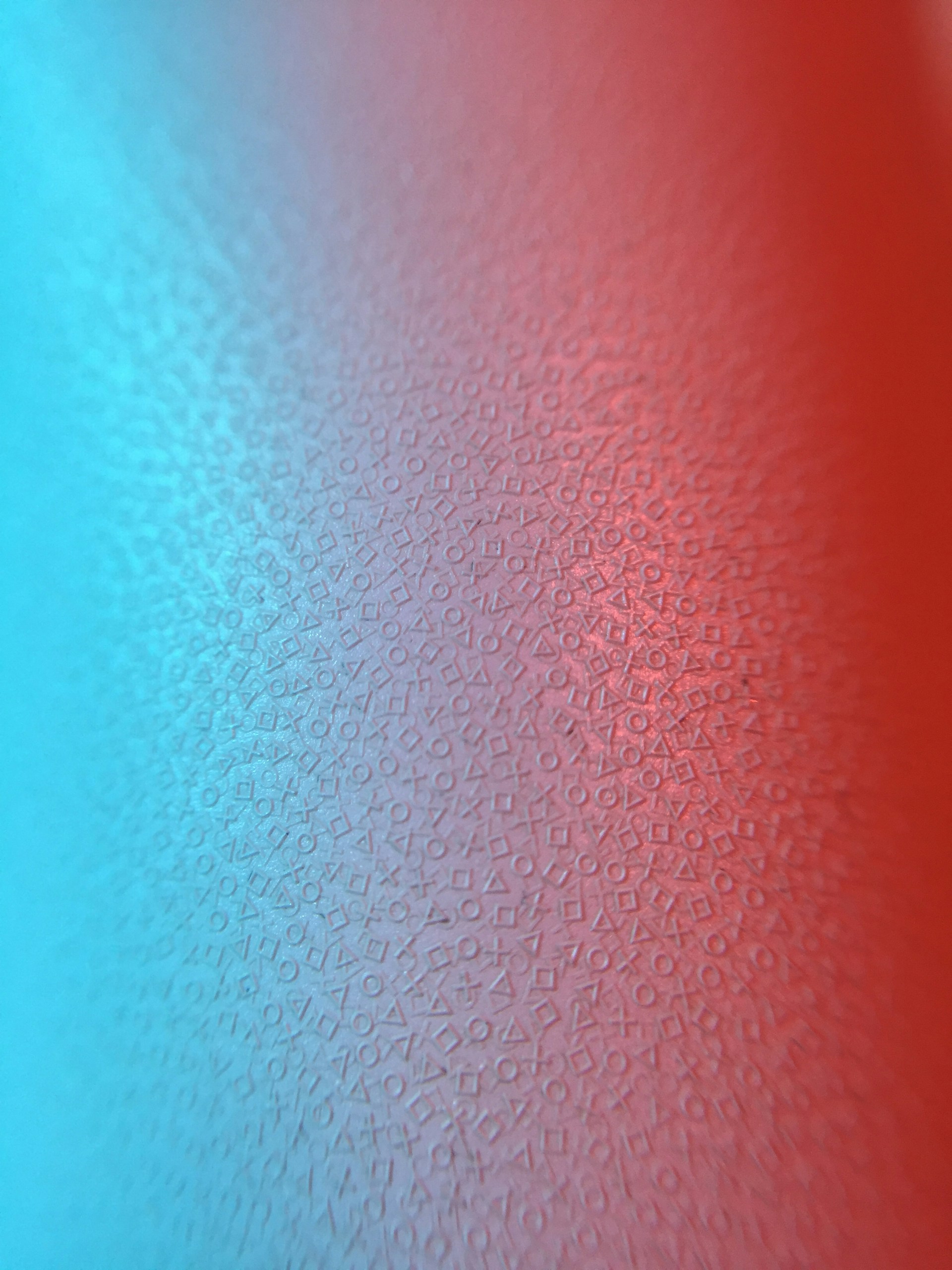 a close up of a red and blue background
