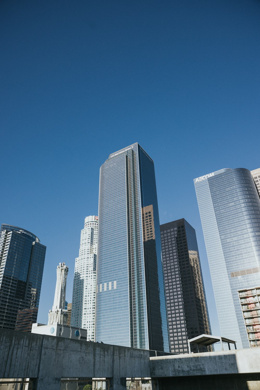 a view of a bunch of tall buildings in a city