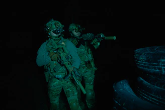 a couple of soldiers standing next to each other