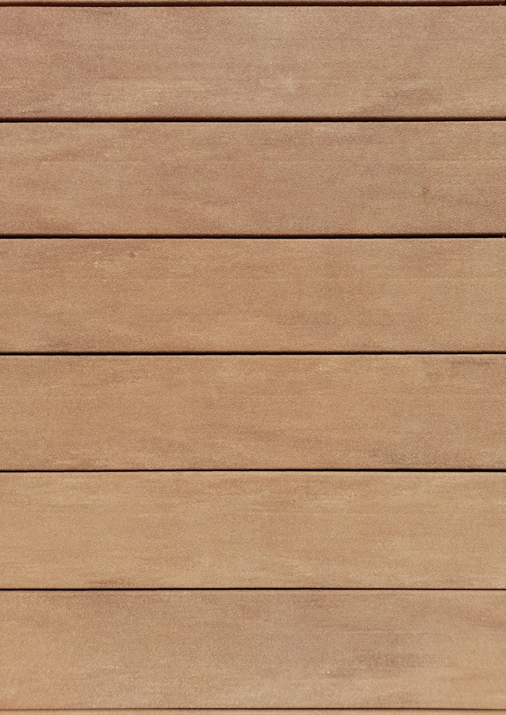 a close up view of a wooden surface